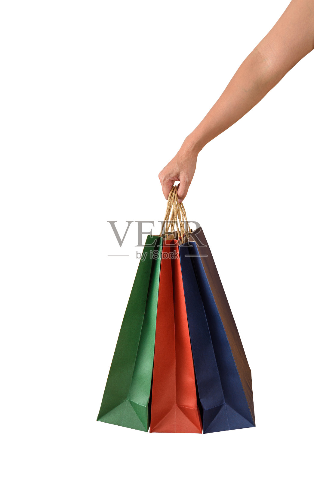 女性手里拿着空白的彩色购物纸袋照片摄影图片