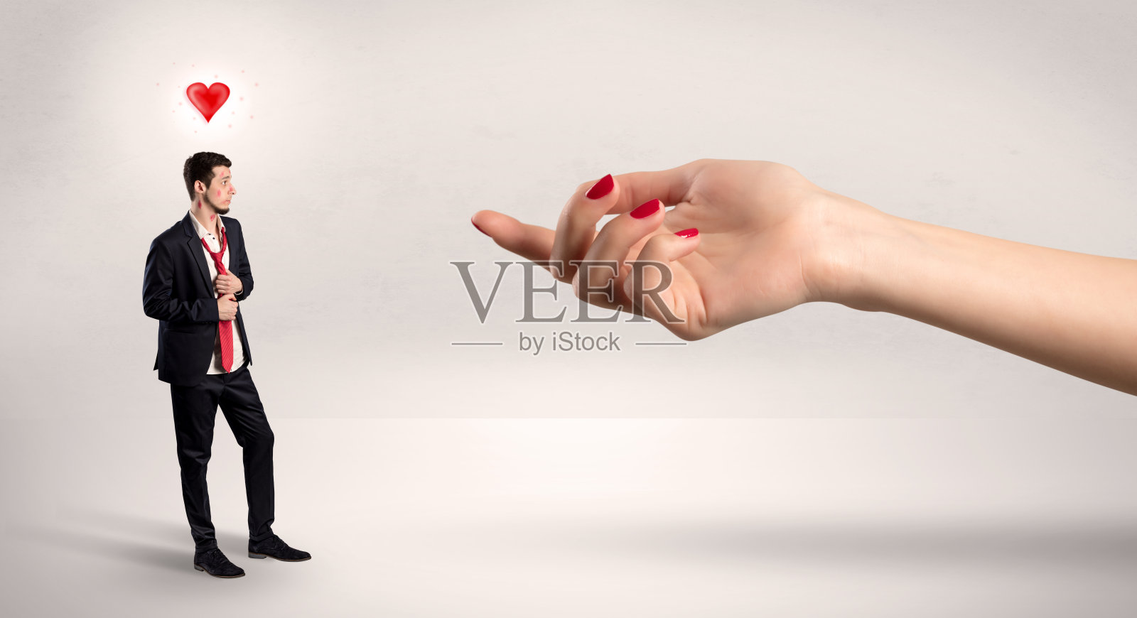 愚蠢的商人喜欢亲吻他的脸照片摄影图片