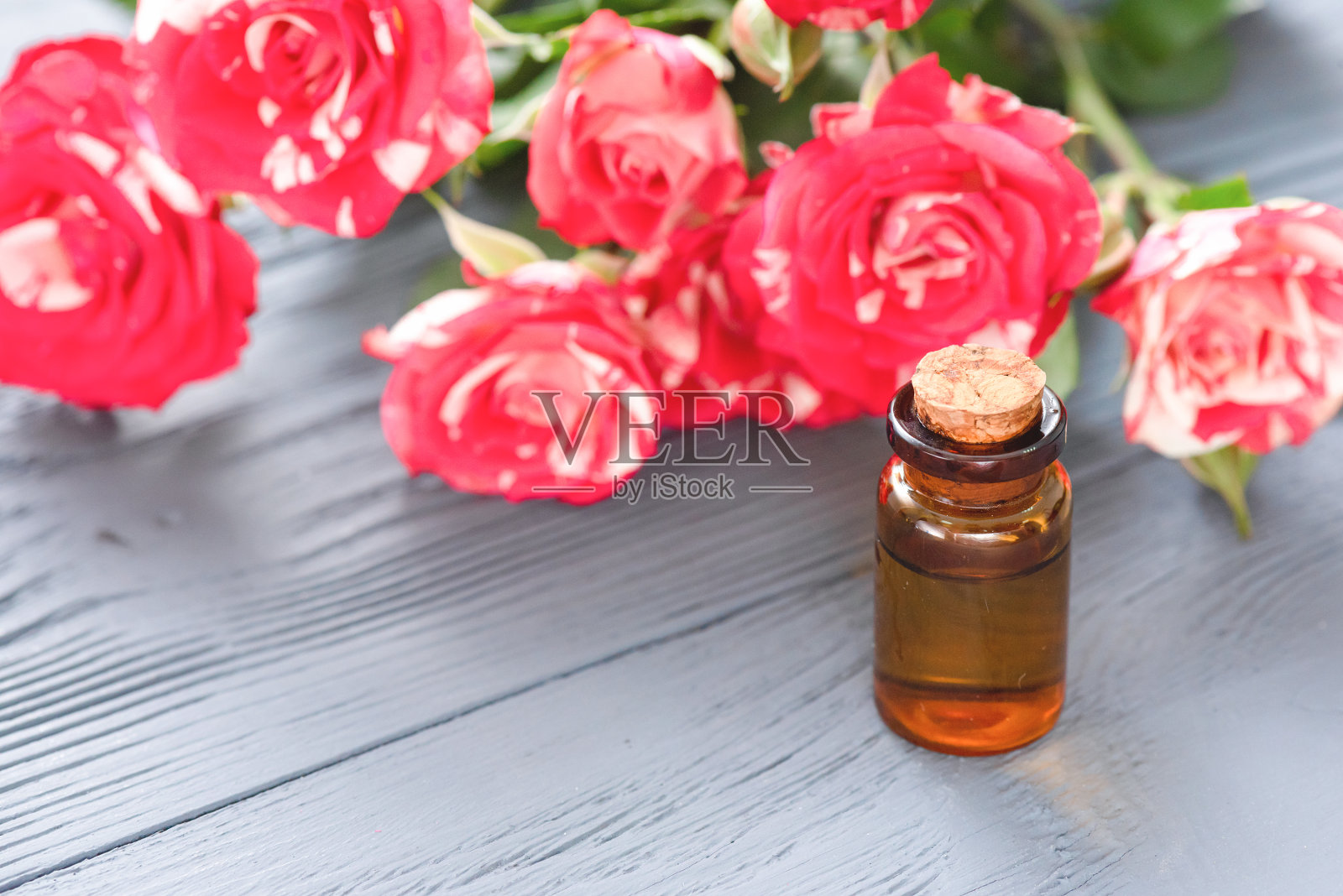 精油玫瑰。照片摄影图片