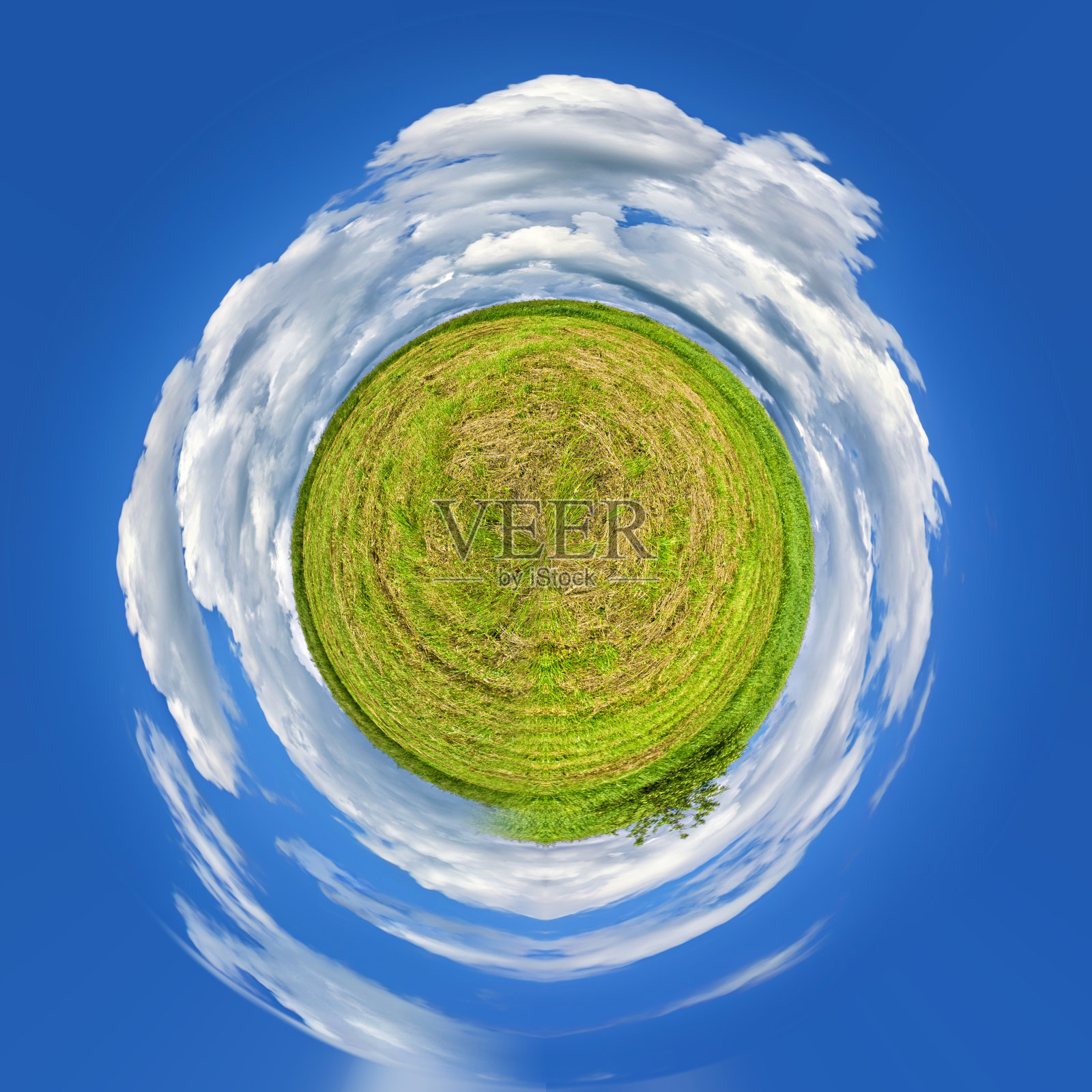 蓝色背景上的绿色星球，艺术照片摄影图片