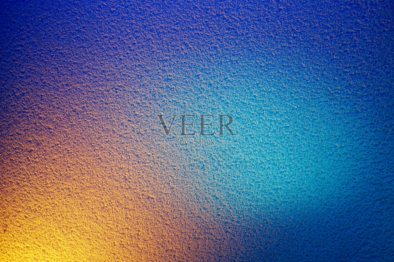 蓝色背景上的黄色和淡蓝色斑点照片摄影图片