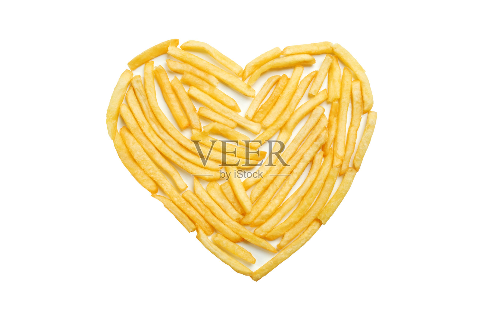 白色背景上孤立的心形薯条。我喜欢土豆。糟糕的街头食品，肥胖，心脏病，快餐。照片摄影图片