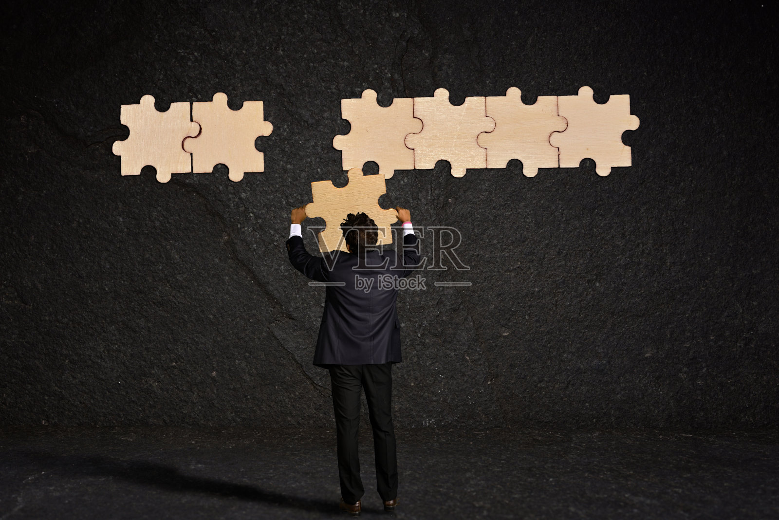 商人完成拼图照片摄影图片