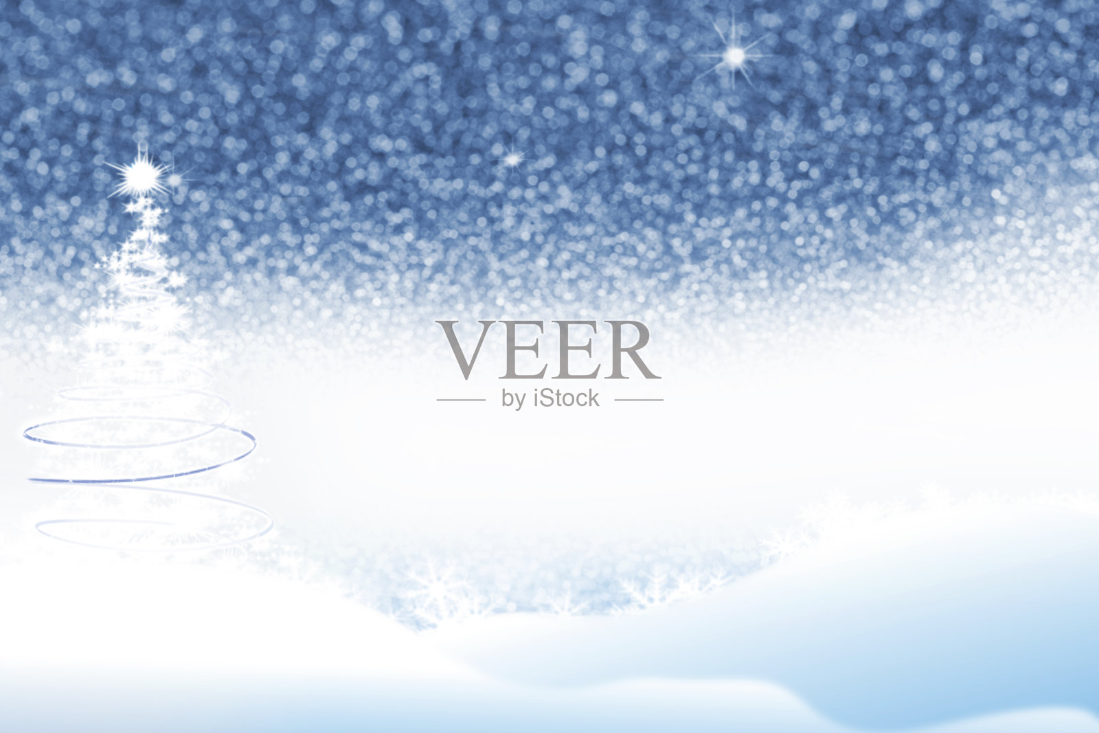 蓝色背景圣诞树照片摄影图片