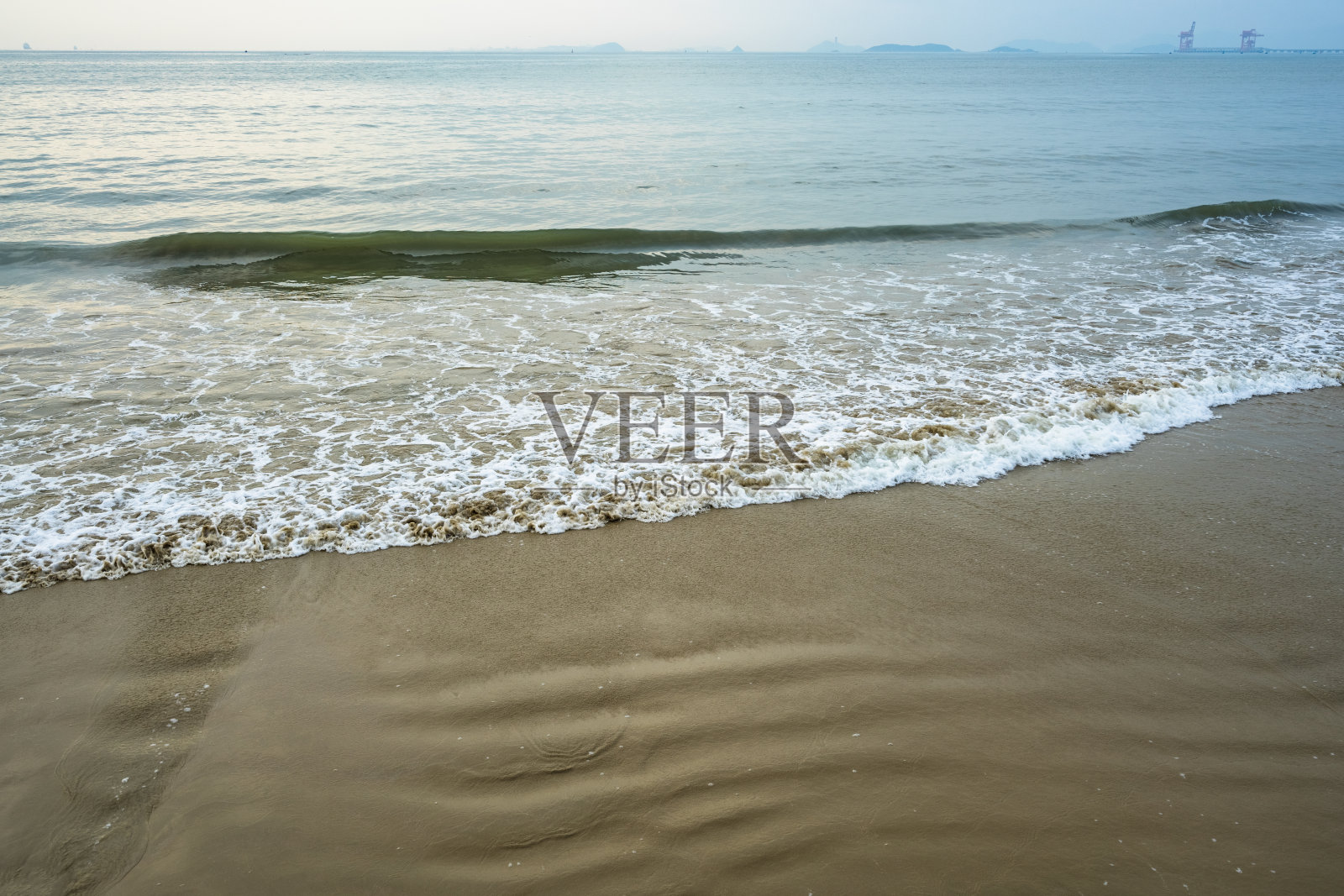 中国海岸，在退潮与日落的海滩照片摄影图片