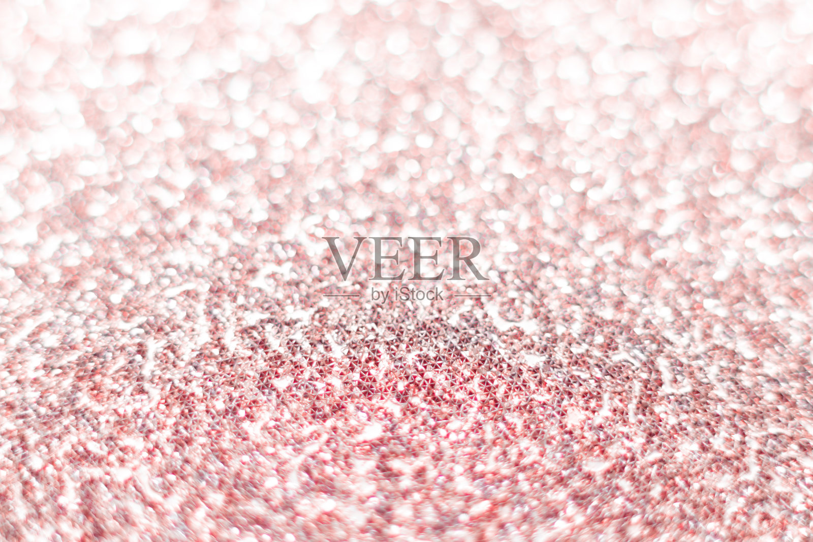 粉色亮片纹理节日闪闪发光的亮片背景特写。情人节、新年或圣诞节用的纸照片摄影图片