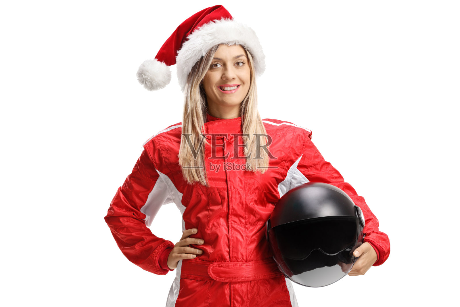 女车手戴着圣诞老人帽，拿着头盔照片摄影图片