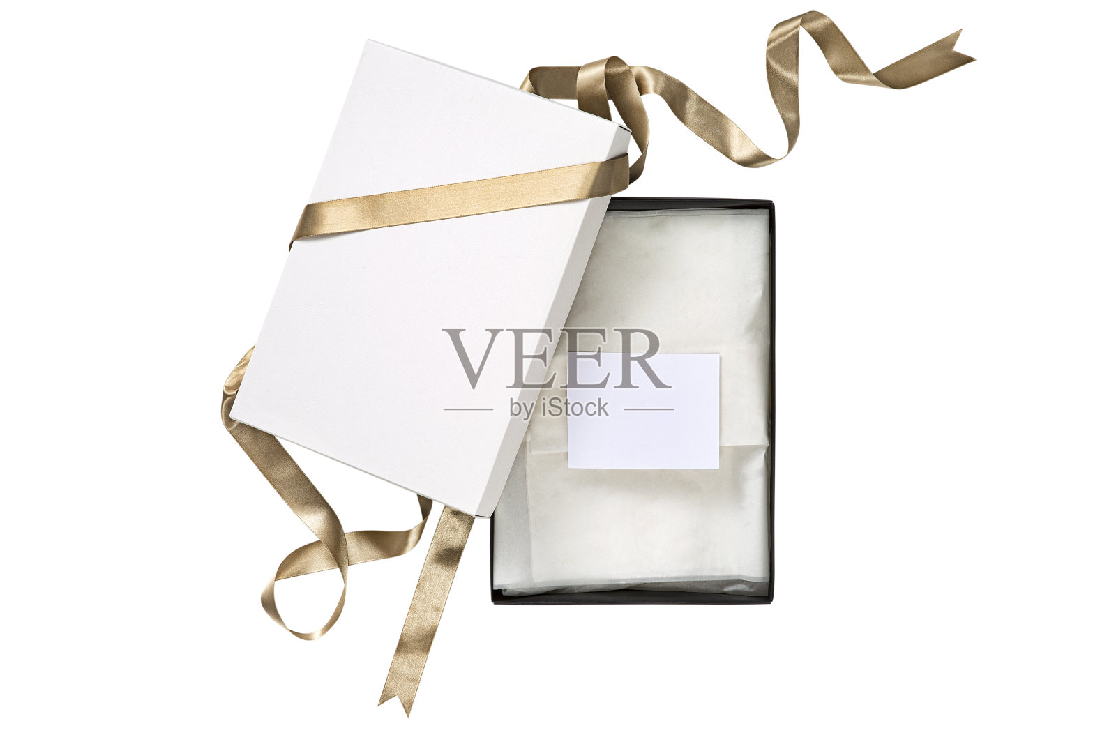 打开带有礼品标签蝴蝶结的礼盒照片摄影图片