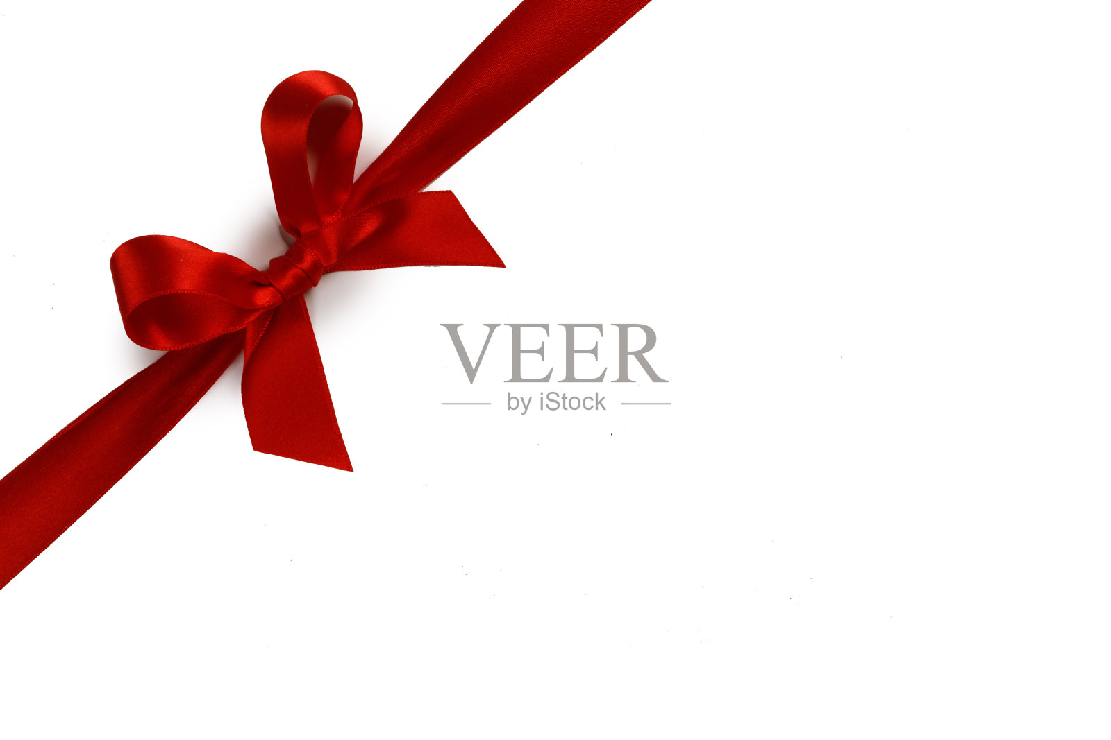 红色丝带蝴蝶结孤立在白色上照片摄影图片