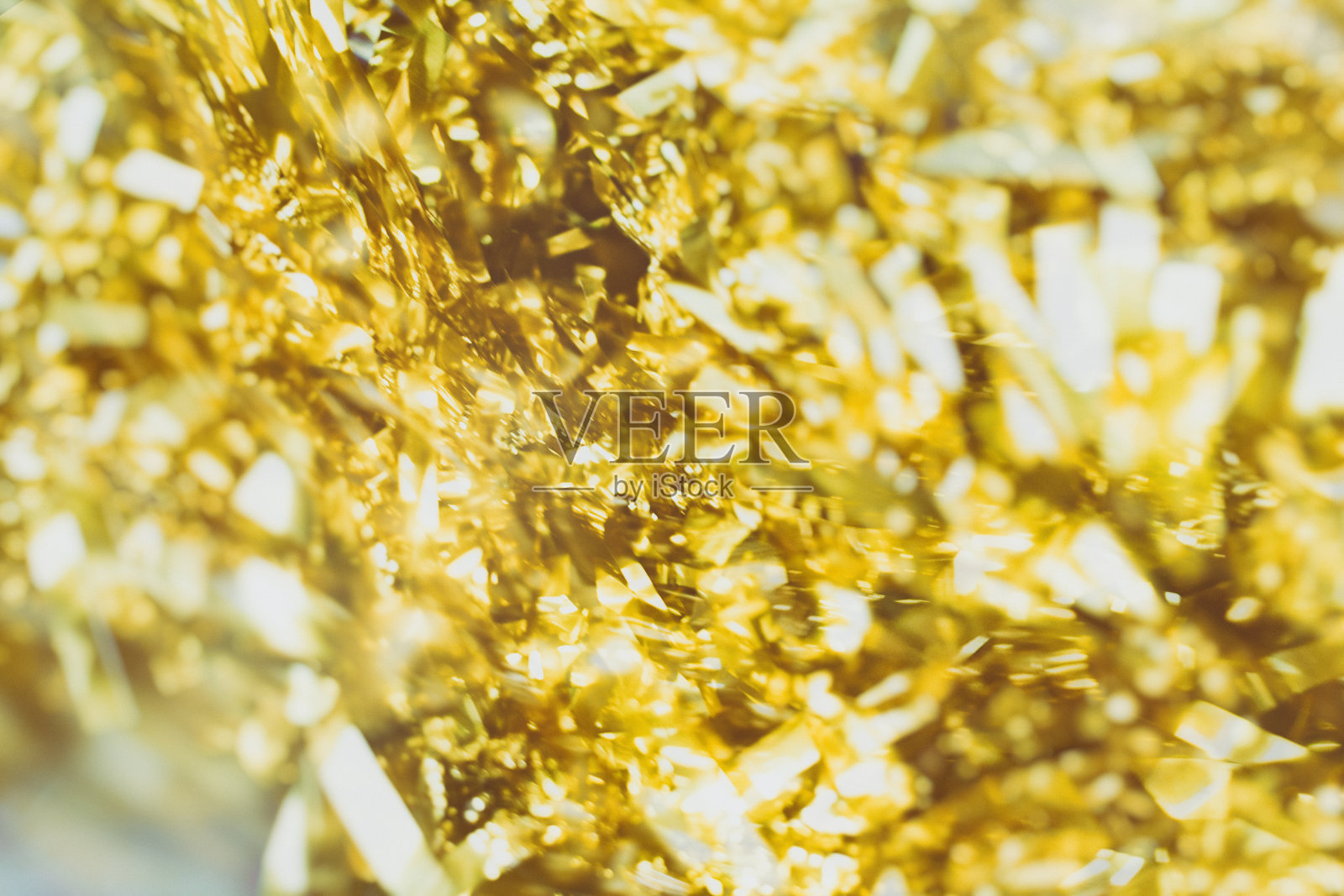 金色闪耀时尚背景。圣诞节的背景。照片摄影图片