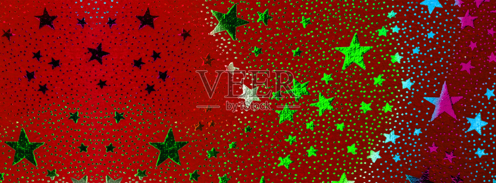 旗帜金色，充满活力，时髦的霓虹灯颜色星星在红色的纸。照片摄影图片