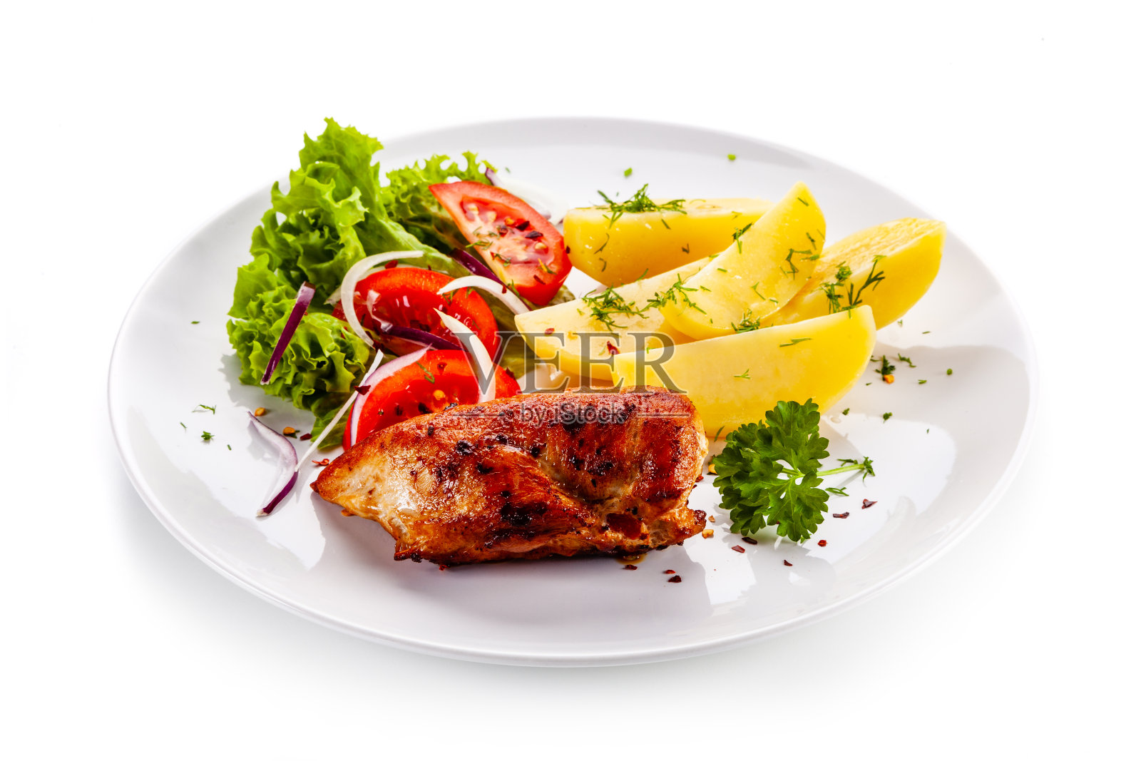 炸鸡胸和蔬菜在白色的背景照片摄影图片