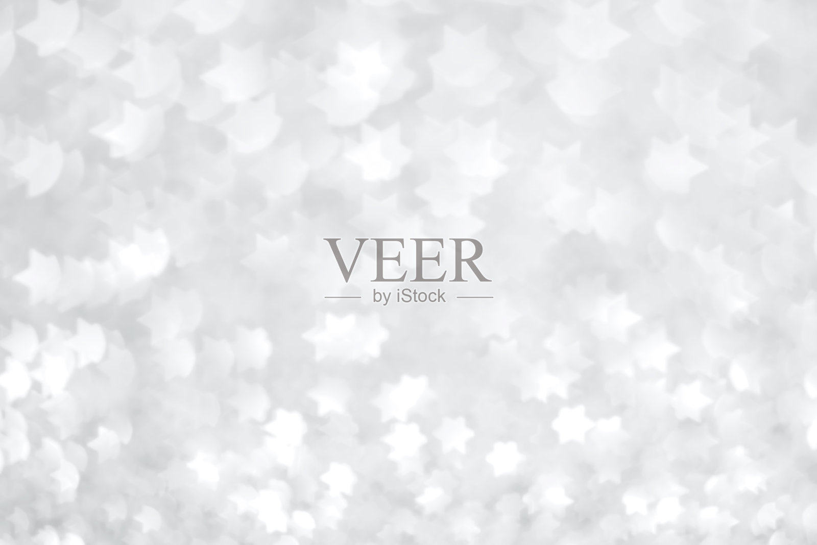 圣诞背景-六角星形状的散景(灰色)照片摄影图片