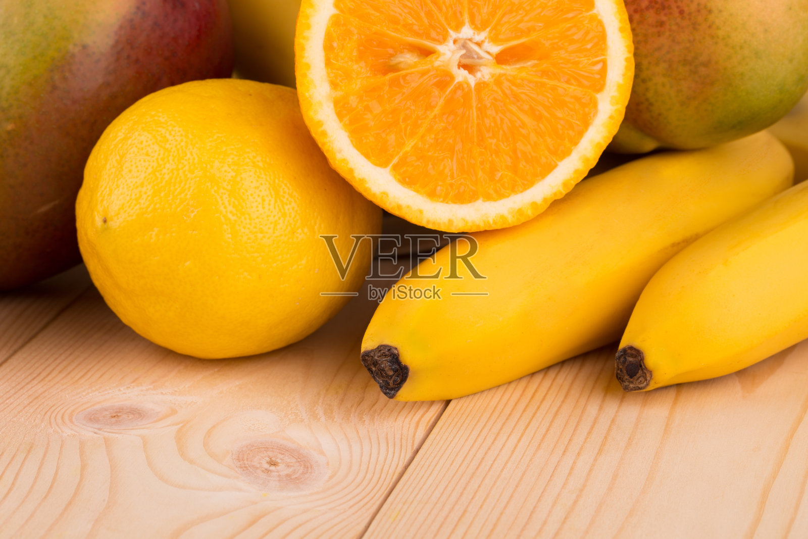 柑橘类水果和芒果。照片摄影图片