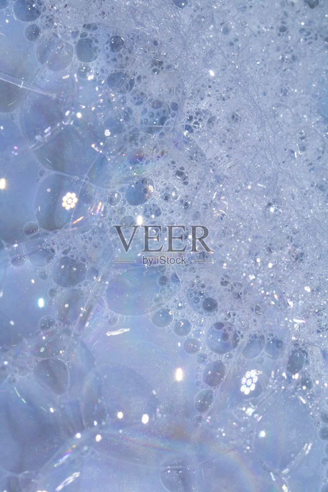 浴水泡沫泡沫的特写背景在蓝色照片摄影图片