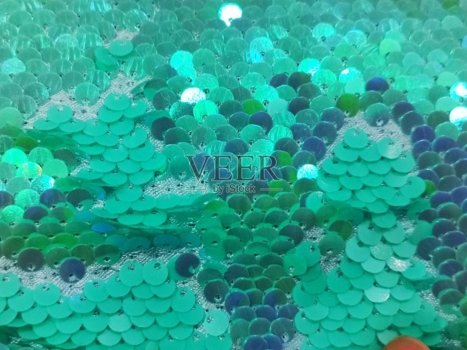 明亮和闪亮的鳞片背景。照片摄影图片