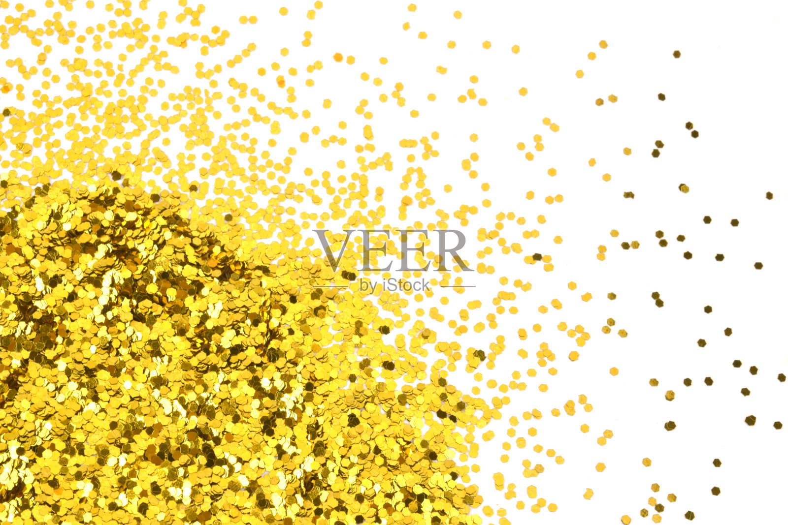 金色在白色的背景上闪闪发光。庆祝的背景。金色的五彩纸屑。照片摄影图片