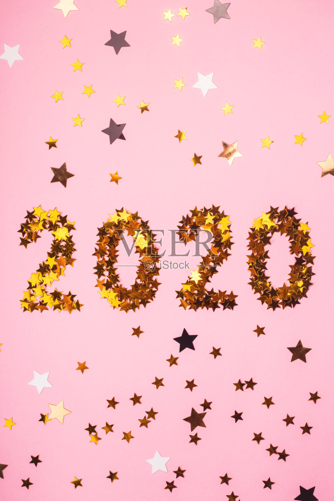 2020新年粉色背景金色纸屑照片摄影图片