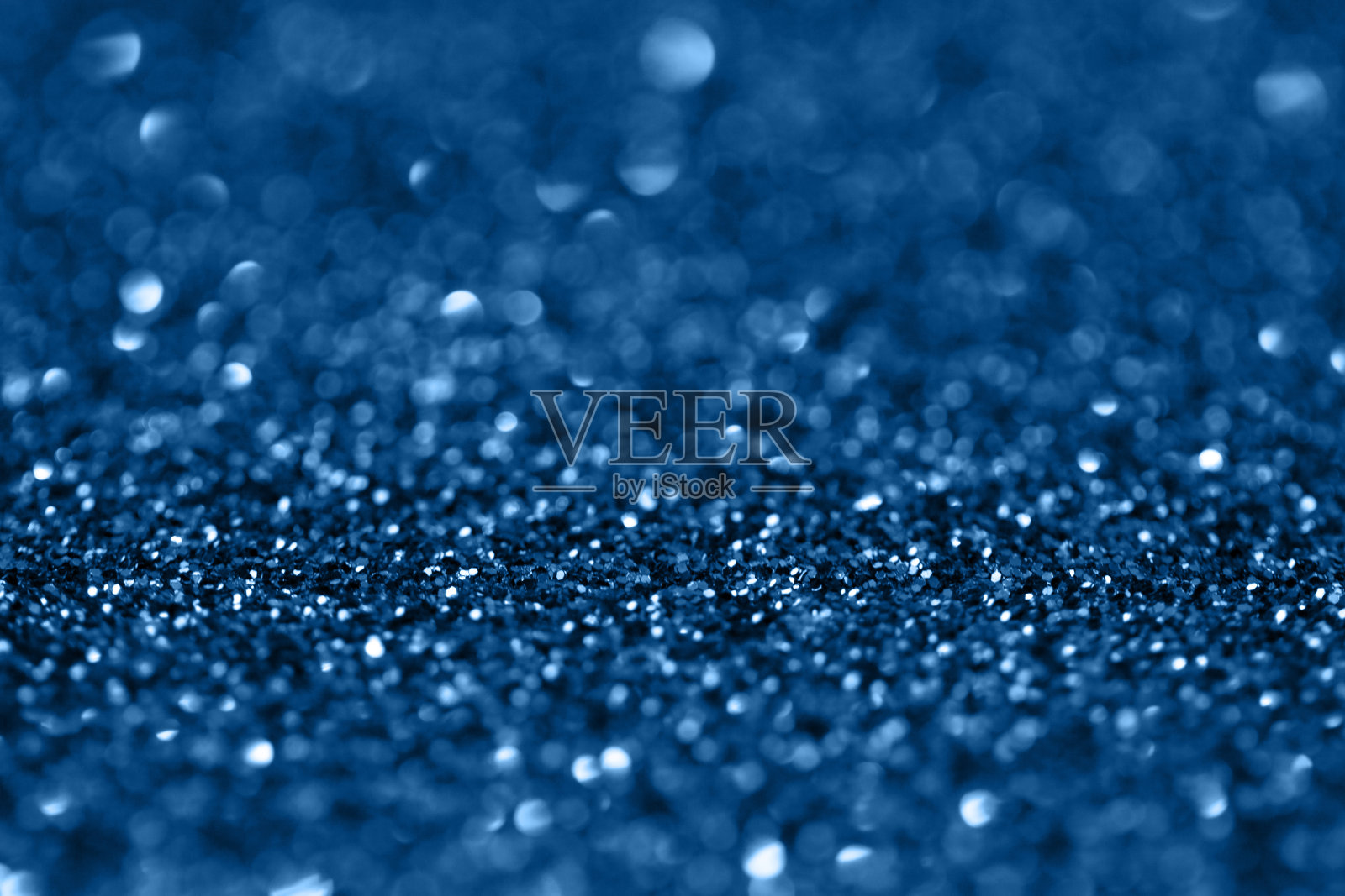 蓝色的背景和闪光照片摄影图片