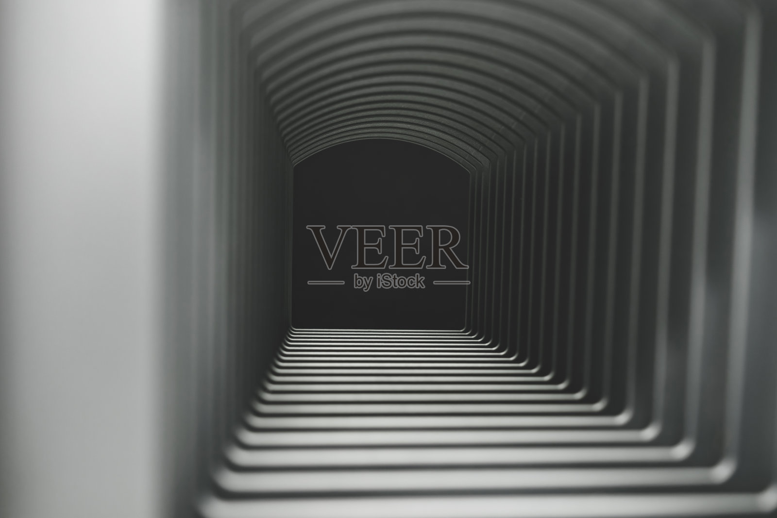 美丽的抽象灰色隧道和黑色末端背景。照片摄影图片