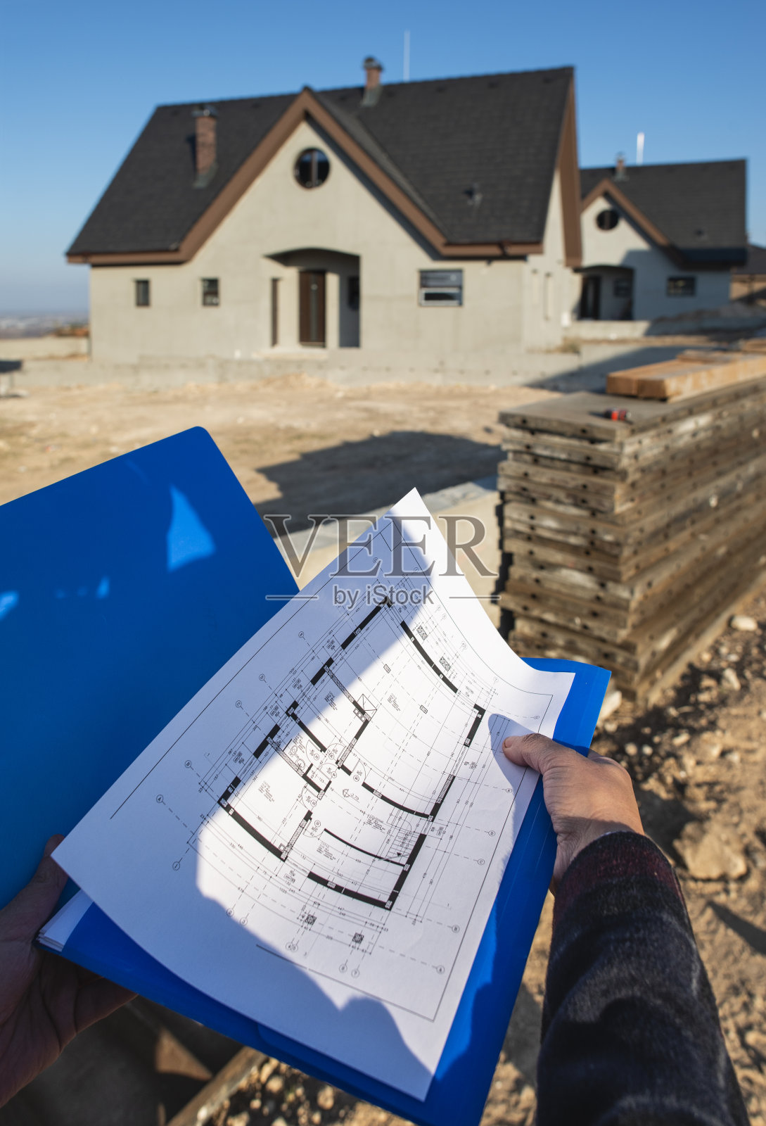 新建房屋和蓝图照片摄影图片