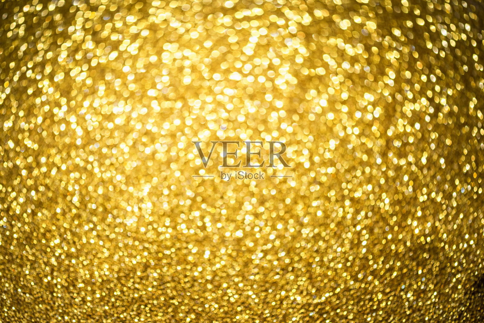 金色闪光散景灯光纹理模糊抽象背景，适用于生日、周年纪念、婚礼、新年或圣诞节照片摄影图片