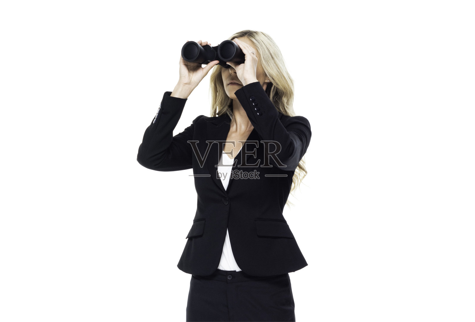正面视图/一个人/腰部以上的20-29岁的成年美丽的白人女性/年轻女性商人/商人站着穿着套装谁是微笑/快乐/愉快谁正在搜索和拿着望远镜照片摄影图片
