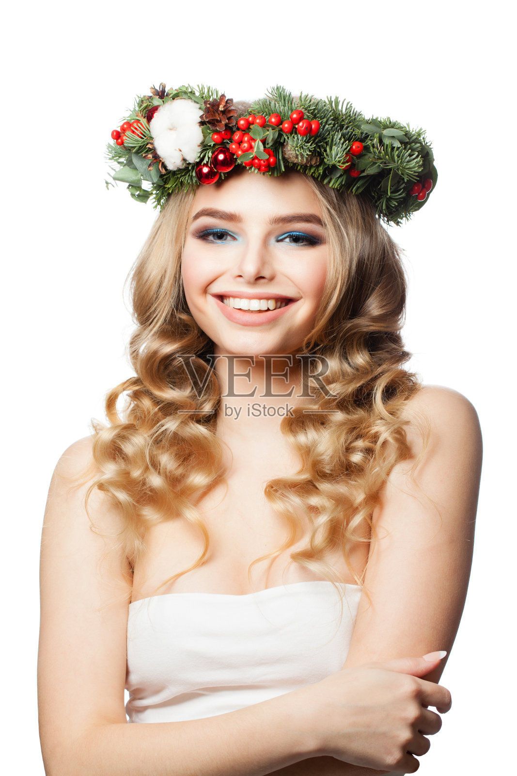 年轻积极的女人圣诞模特被孤立在白色照片摄影图片