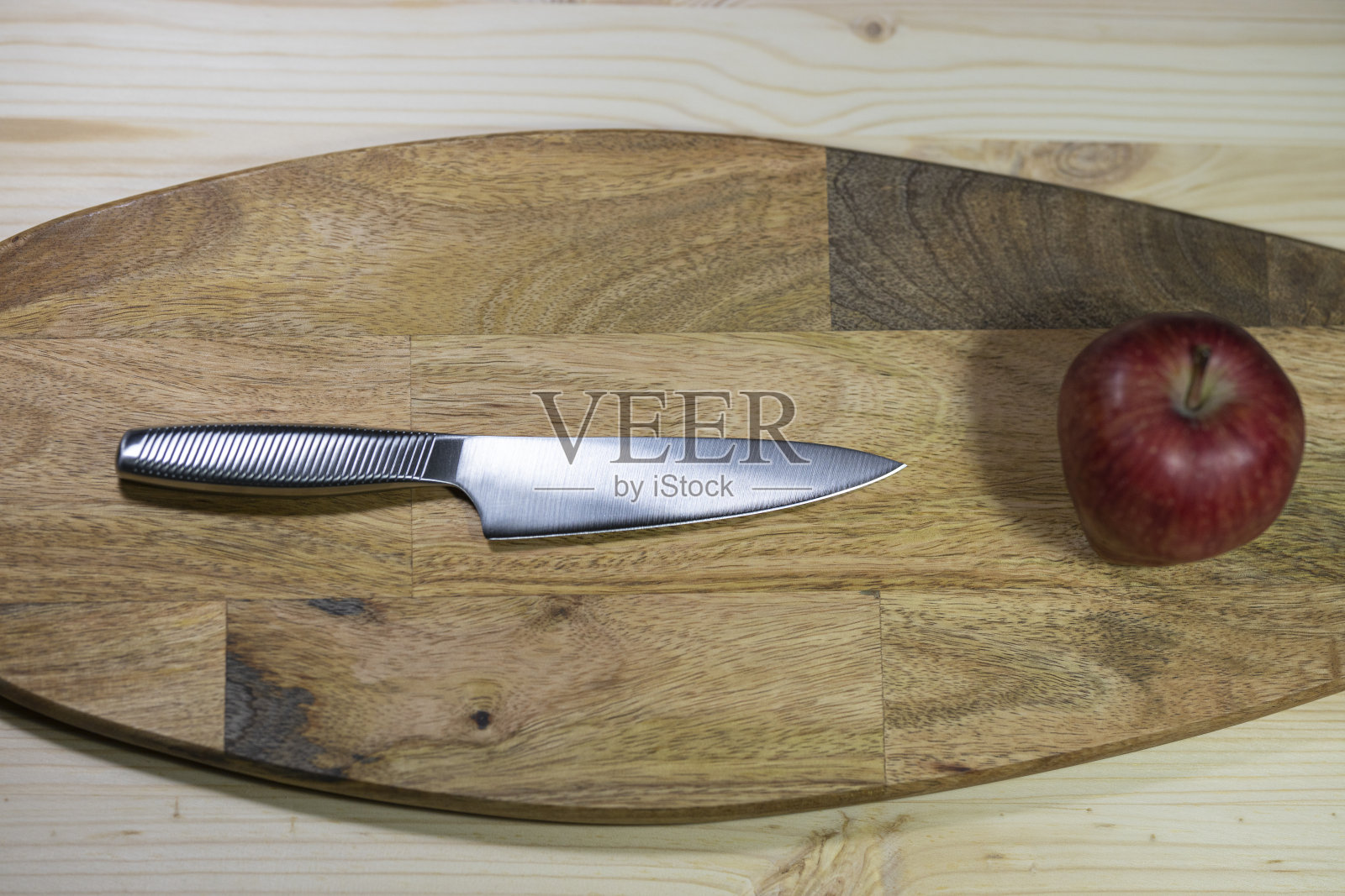 厨师刀和红苹果照片摄影图片