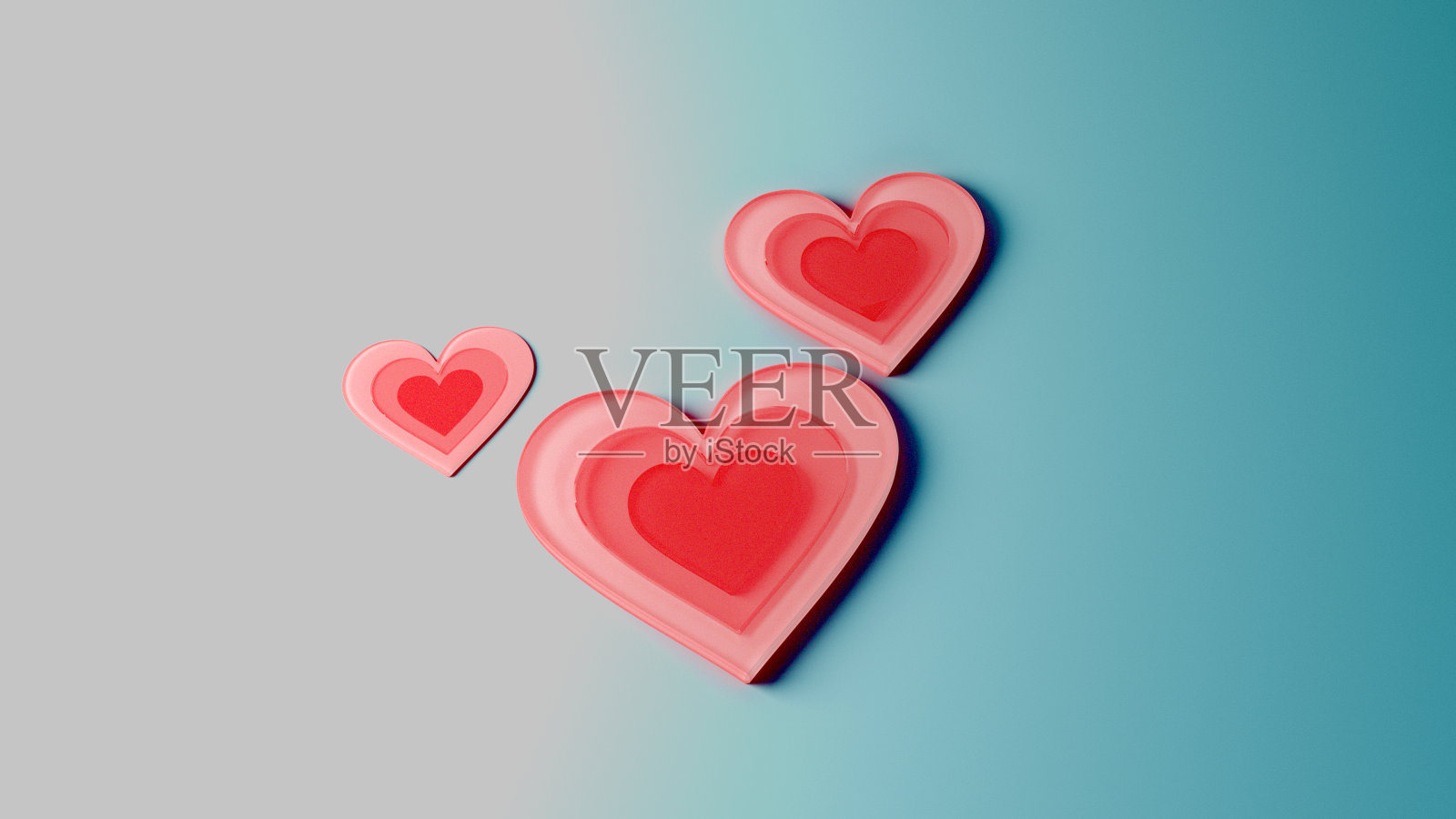 冰冷的地板上放着三个心形图标。照片摄影图片