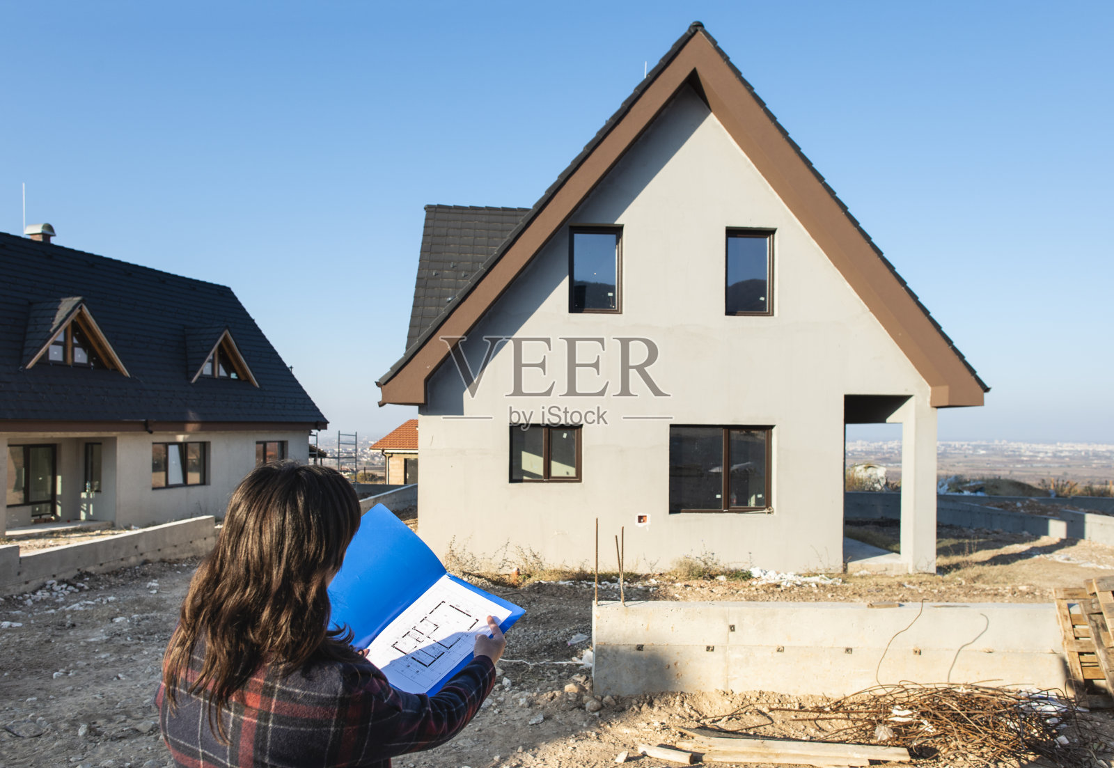 新建房屋和蓝图照片摄影图片