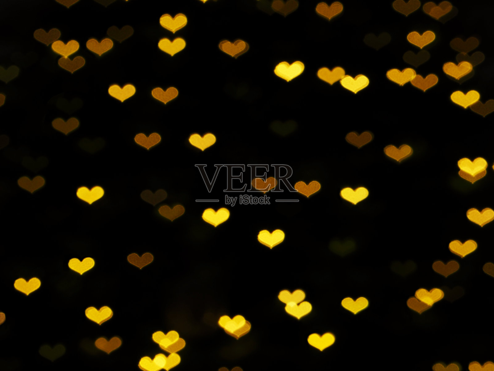 金色模糊的心形照片摄影图片