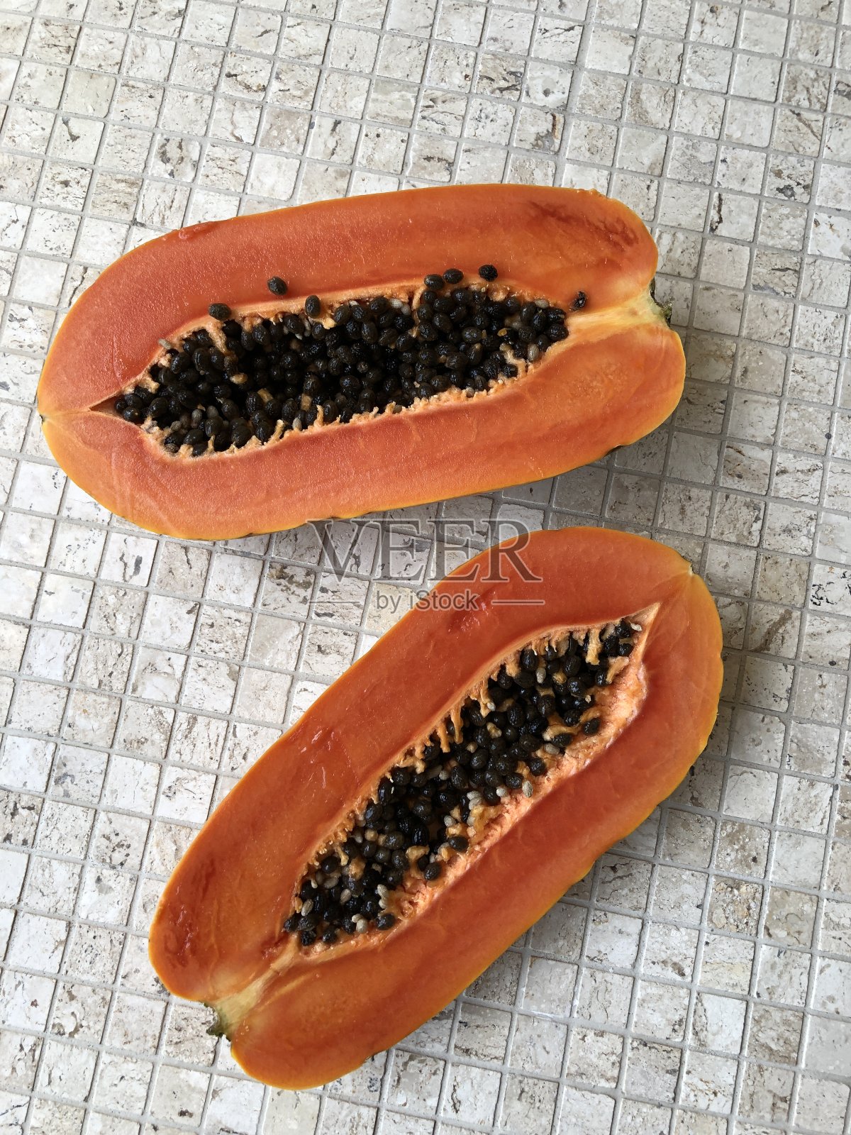 木瓜水果的照片在一个明亮的背景照片摄影图片