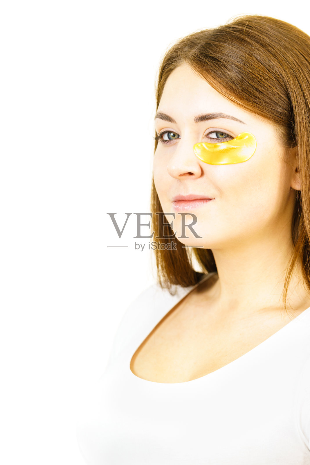 眼睛下面有金色眼罩的女人照片摄影图片