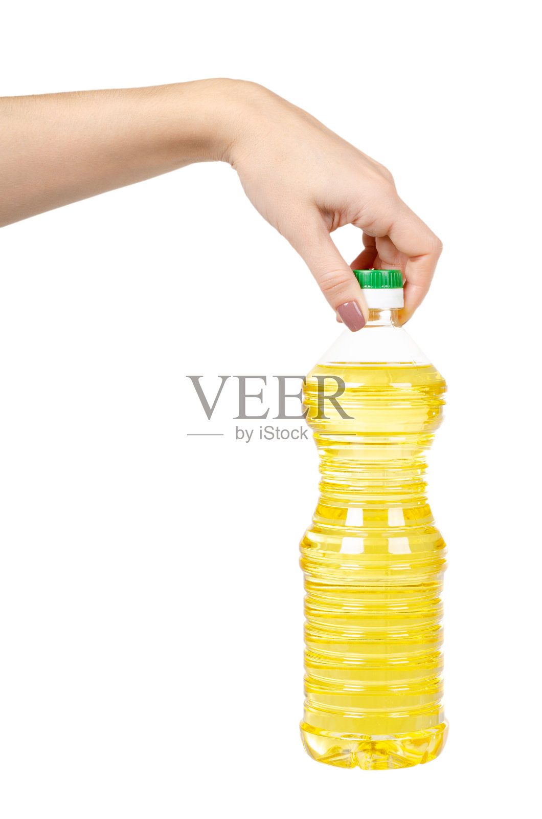 纯葵花籽油塑料瓶。沙拉调味料。照片摄影图片