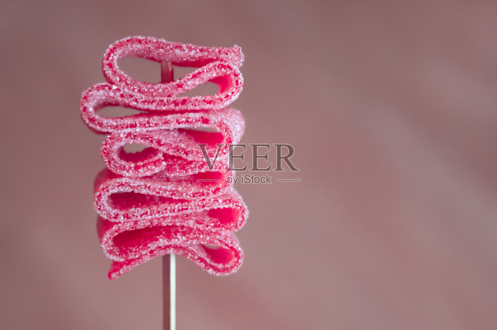 酸卷垫卷曲糖糖果照片摄影图片