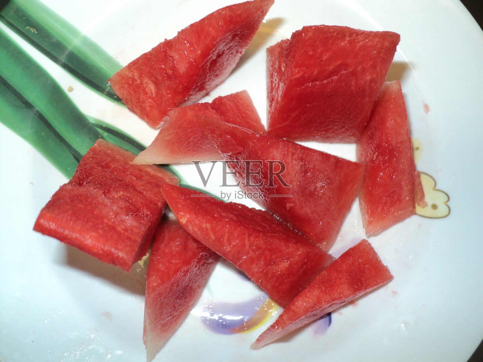 西瓜块色泽鲜红照片摄影图片