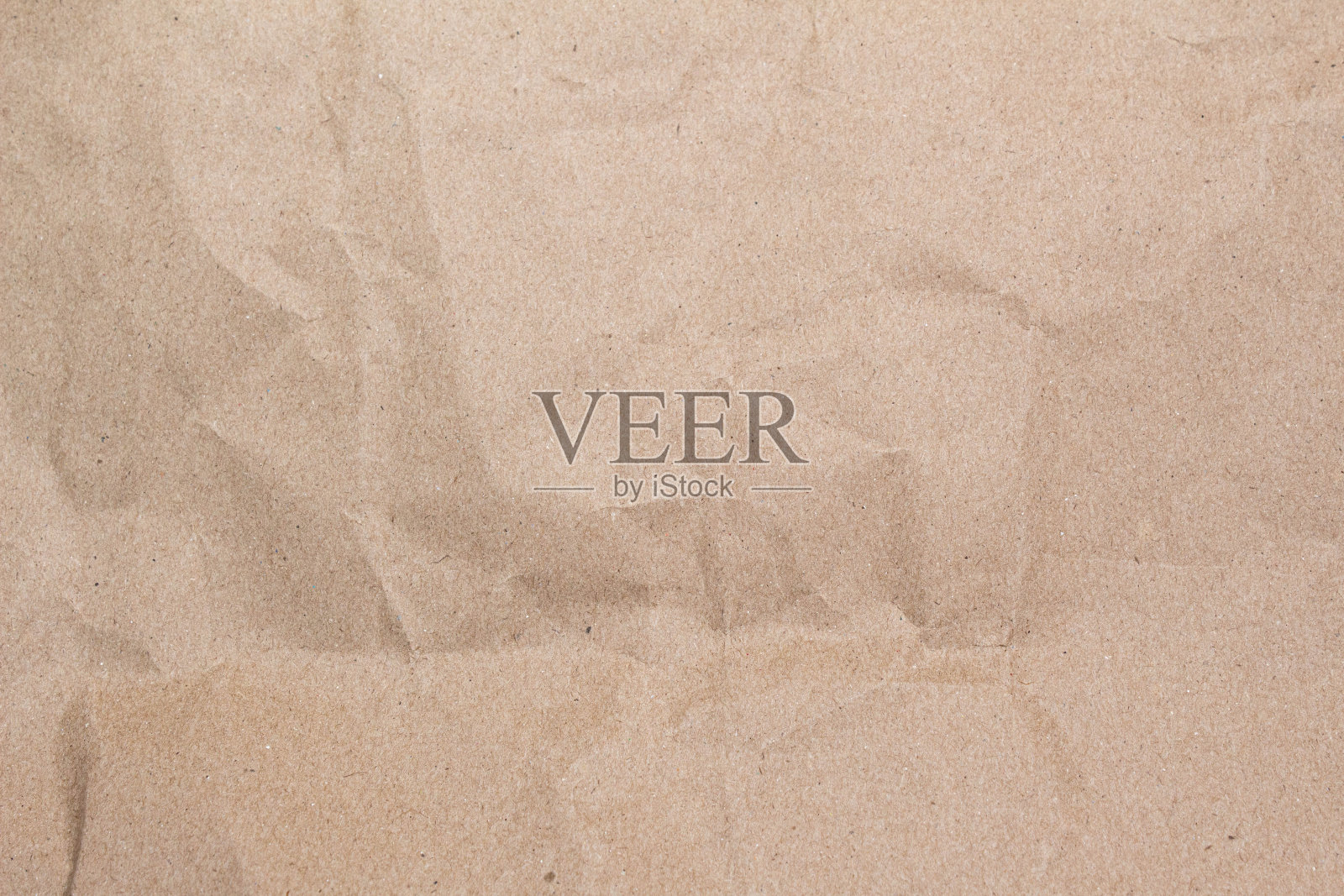 近距离的棕色皱巴巴的纸纹理背景照片摄影图片