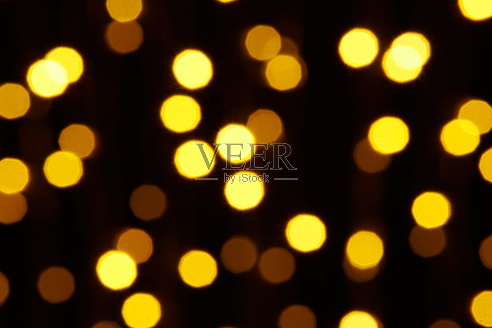 抽象背景-黄色散景在黑色上的照片照片摄影图片