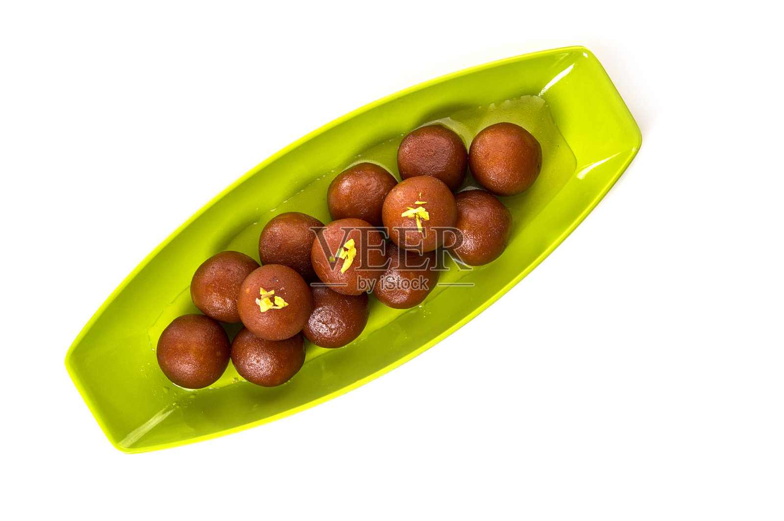 印度甜品Gulab Jamun。甜食孤立在白色背景照片摄影图片