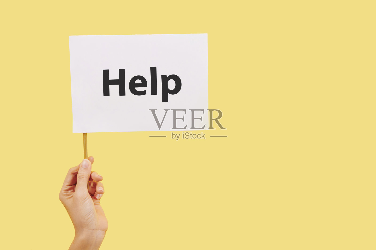 手拿帮助旗照片摄影图片