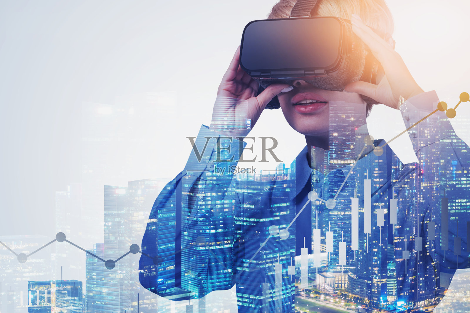 女人在VR耳机看外汇图表照片摄影图片