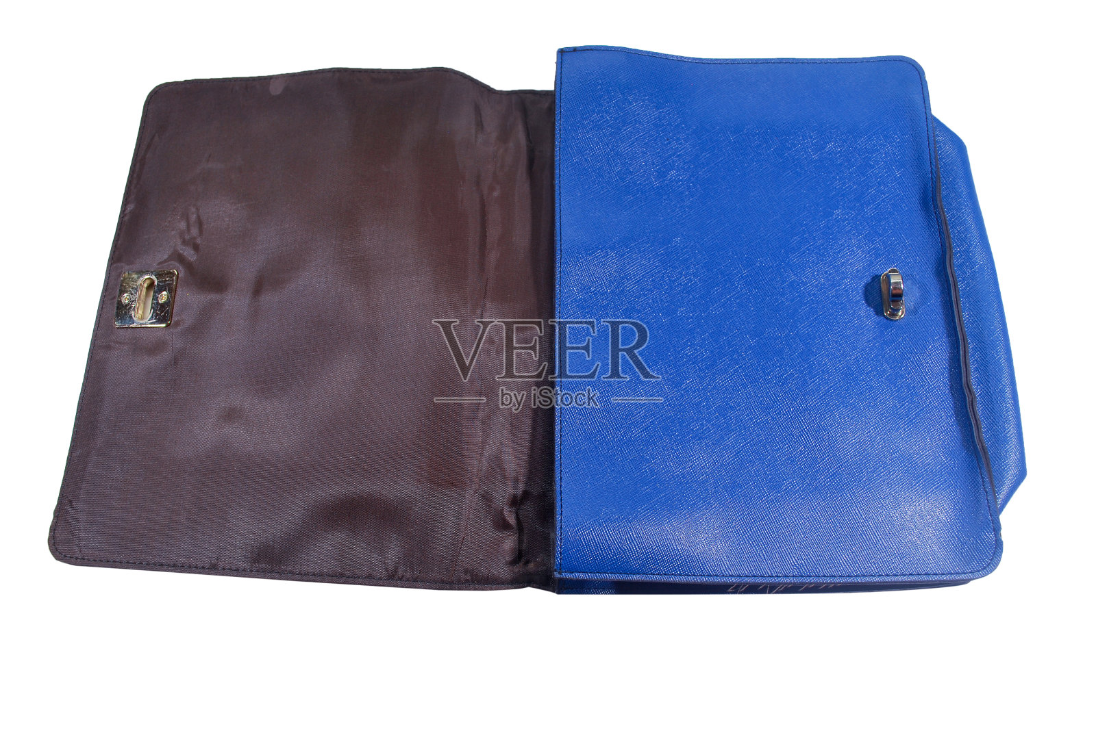 蓝色皮包。照片摄影图片