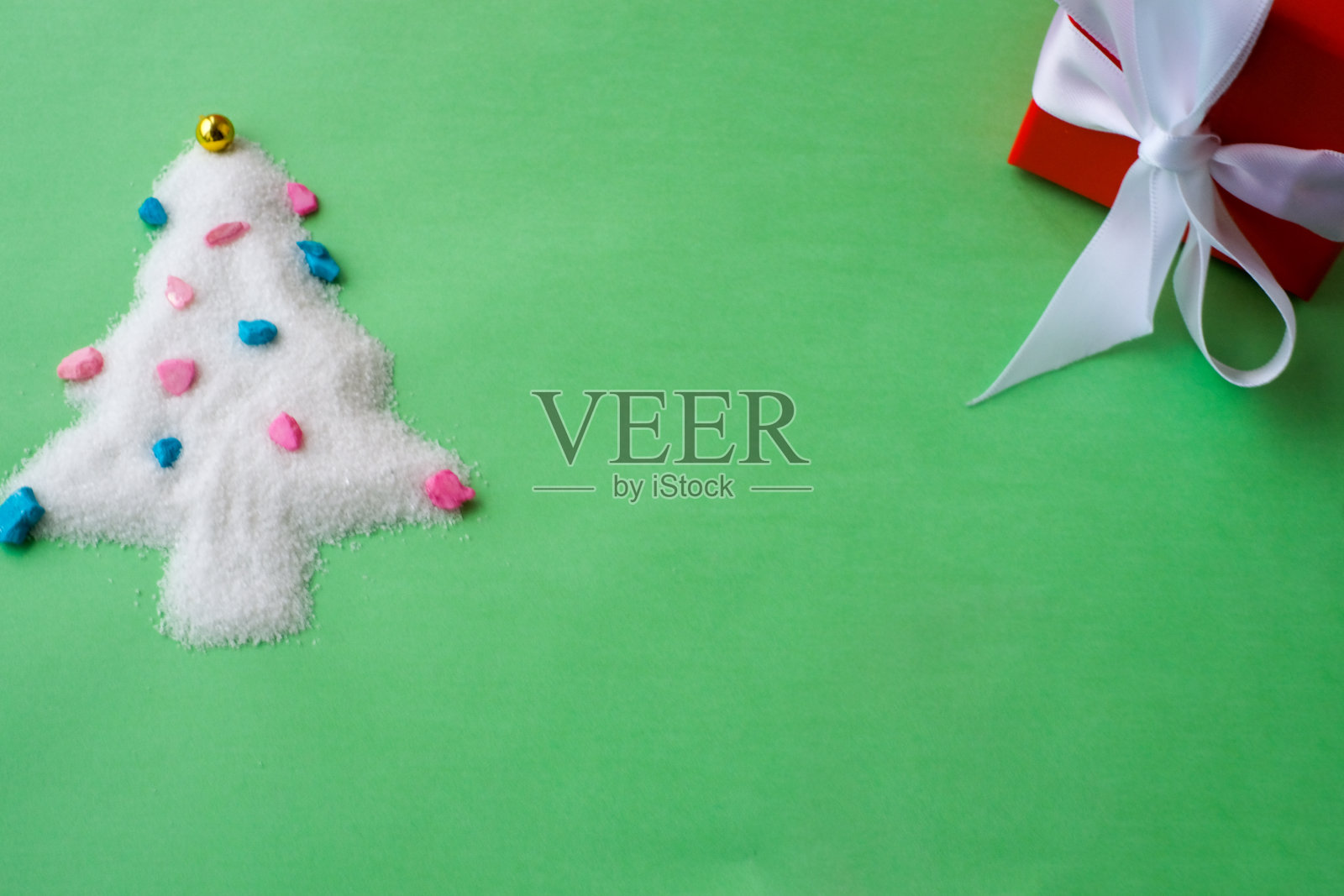 圣诞背景创意色调。金色假日抽象闪光散焦背景与照片摄影图片