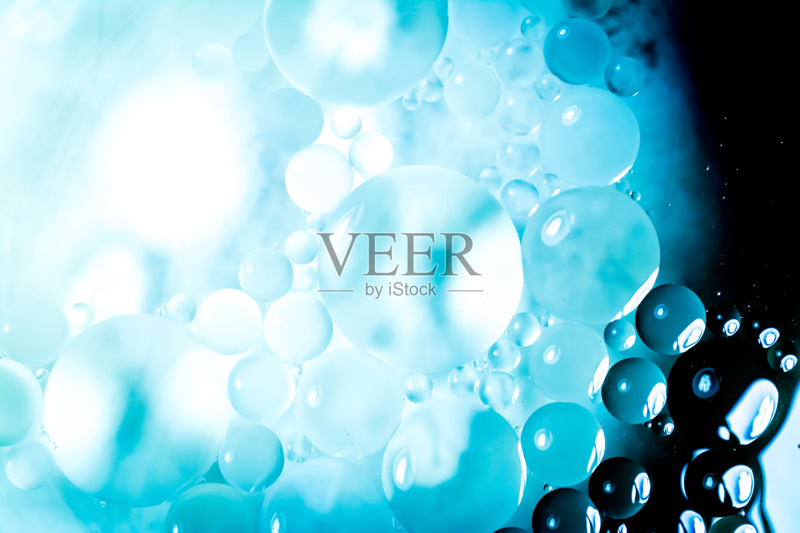 创意抽象背景不同大小的圆与背光和梯度。照片摄影图片