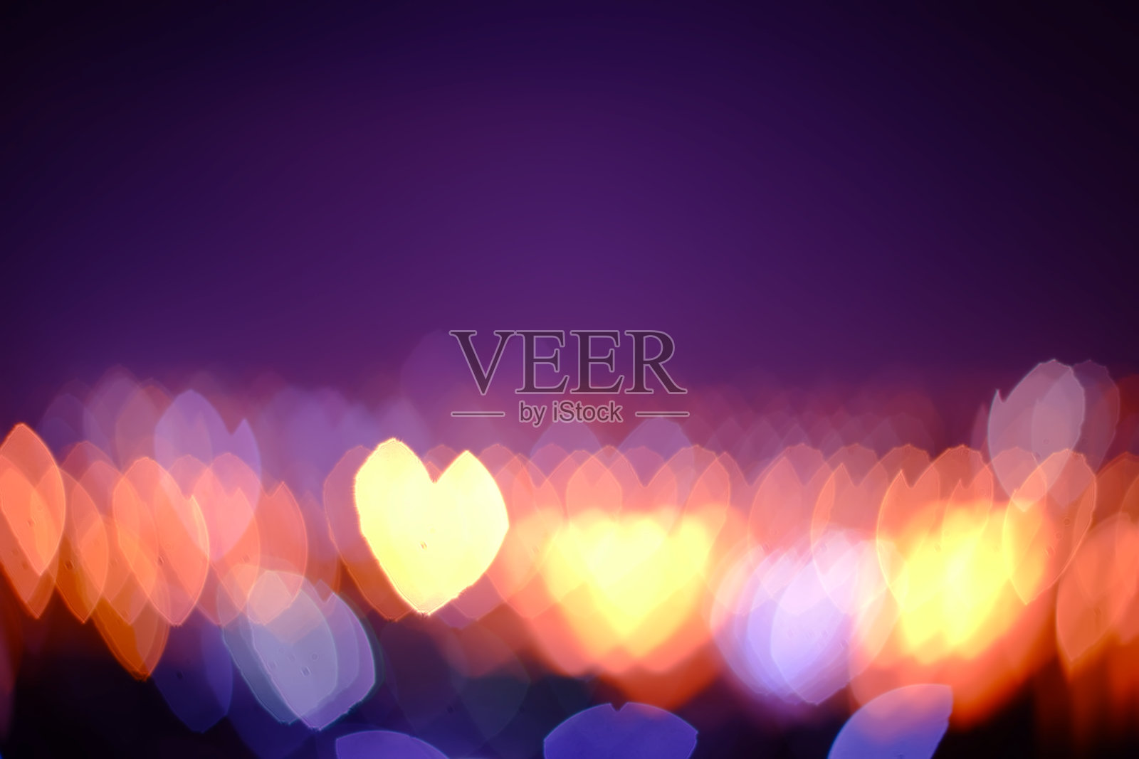 抽象模糊了心的散景灯光背景，色彩模糊了城市的夜光照片摄影图片