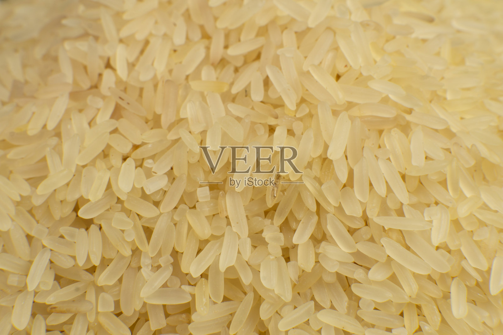 长粒白米背景。宏。米饭质地。俯视图照片摄影图片