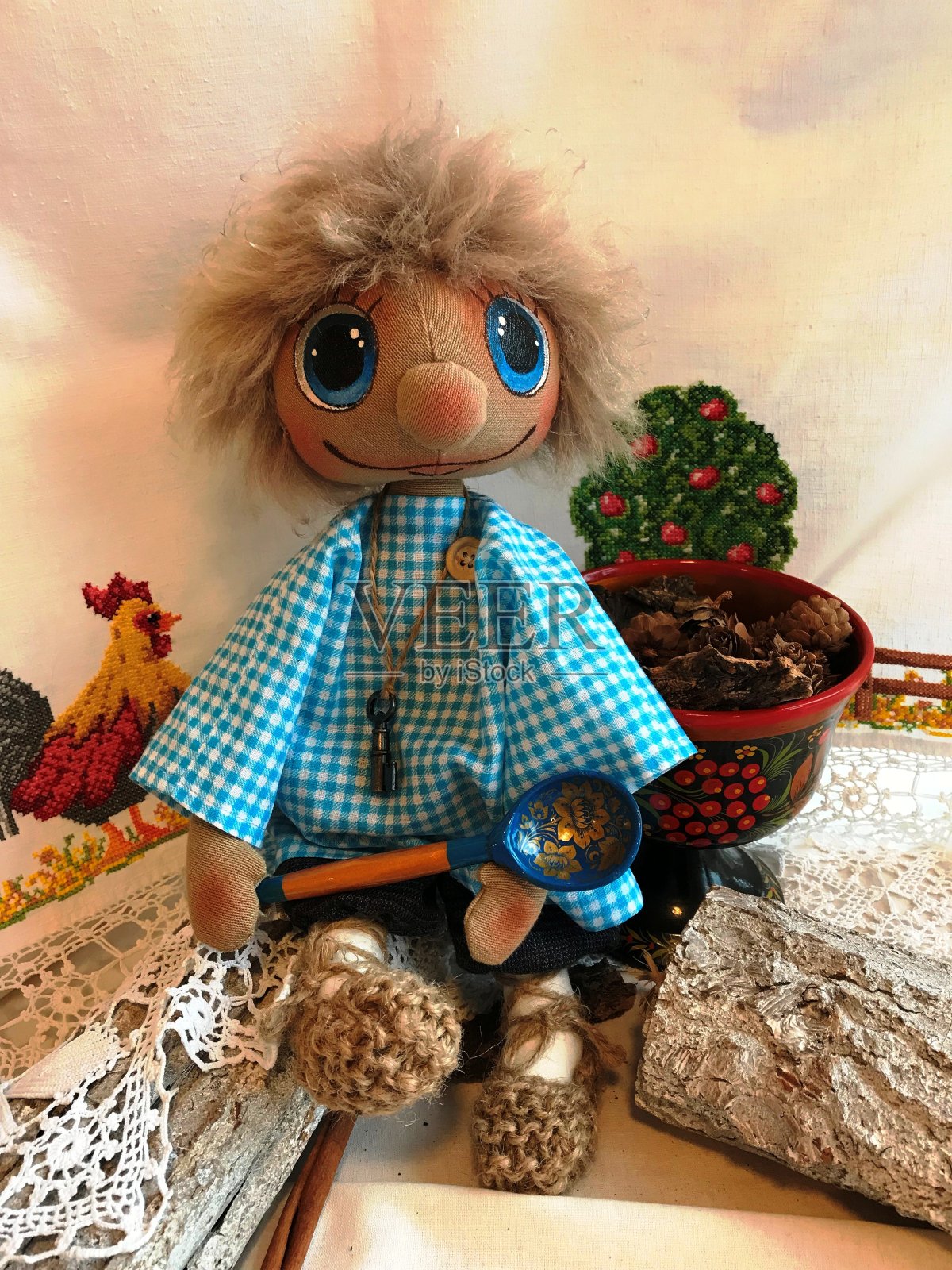 手工纺织玩具。照片摄影图片