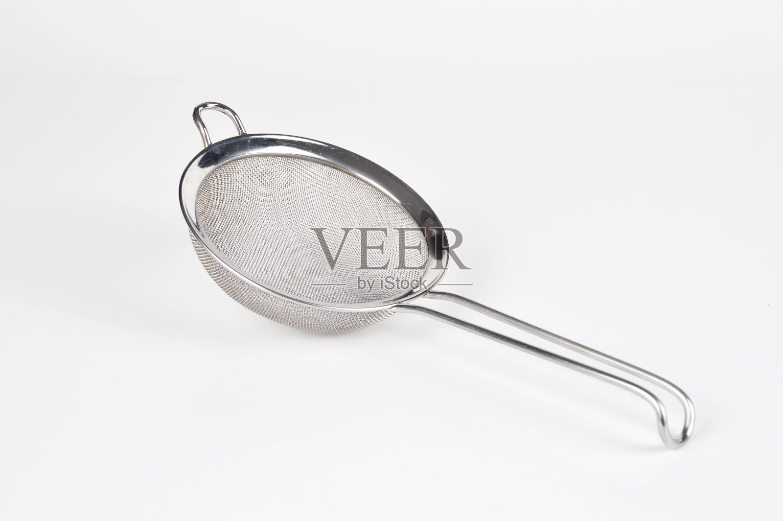 白色背景上的筛子照片摄影图片