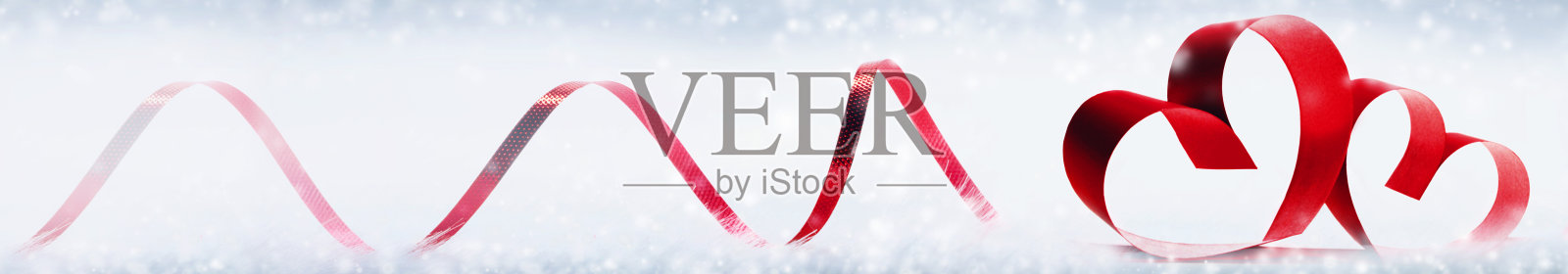 白色背景上的红色爱心丝带照片摄影图片